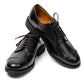 Schuhe "Officer Gibson" aus schwarzem Patent-Leder - Handarbeit