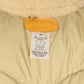 Rocky Mountain Featherbed x MJ: Daunenweste "Christy Vest" mit Lammfellkragen