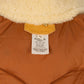 Rocky Mountain Featherbed x MJ: Daunenweste "Christy Vest" mit Lammfellkragen