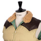 Rocky Mountain Featherbed x MJ: Daunenweste "Christy Vest" mit Lammfellkragen