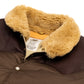 Rocky Mountain Featherbed x MJ: Daunenweste "Christy Vest" mit Lammfellkragen - Japanese Item